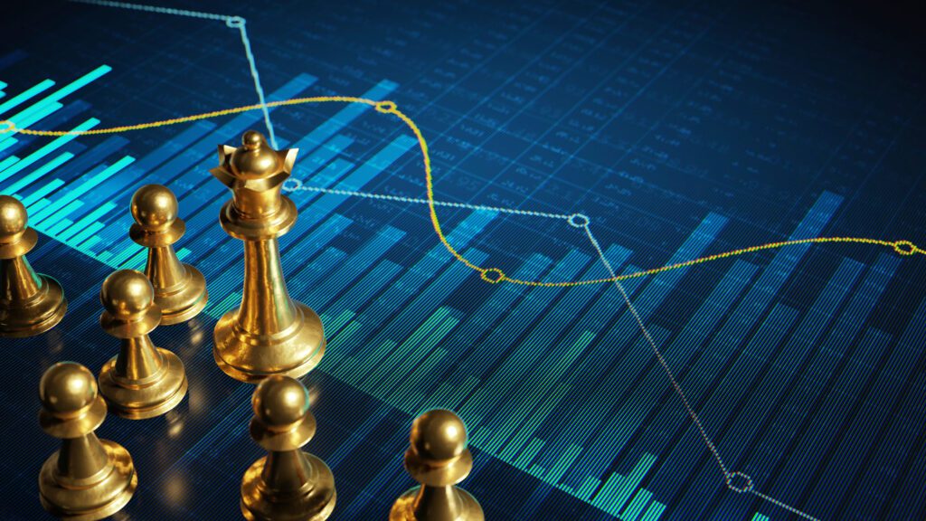 Chess pieces on a screen with graphs